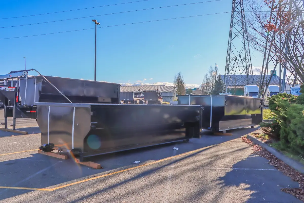 Roll-off dumpster ready for waste disposal at job site for 12 Yard Dumpster Rental in Uvalde